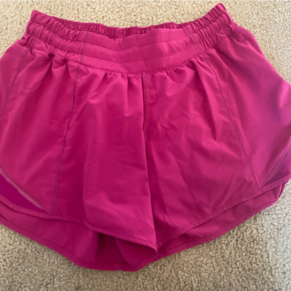 Lululemon Hotty Hot shorts - Size 6.  Magenta. 4” inseam.  Gently used.